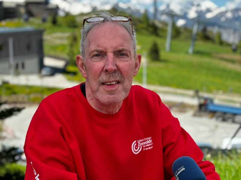 Rob vd Kort met op de achtergrond de alpen